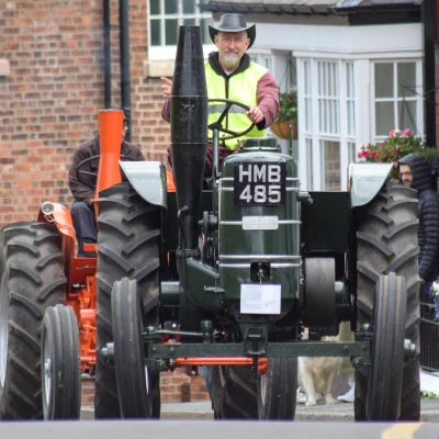 a field marshal tractor in the parade through audlem