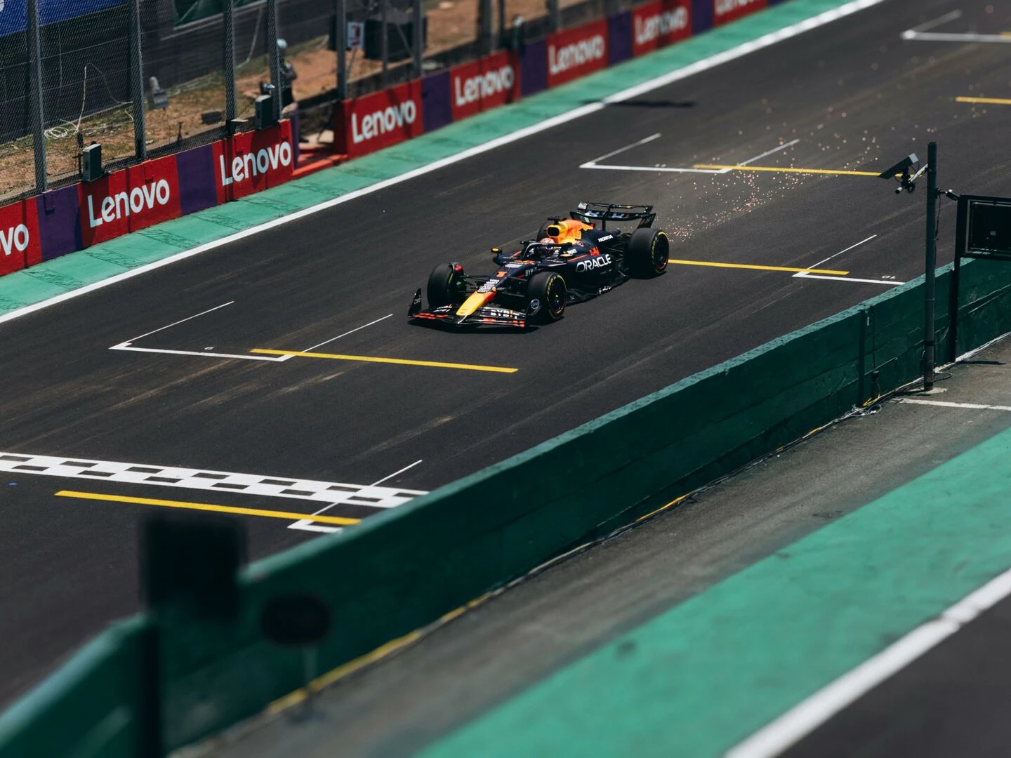 a formula 1 car speeds down the track during a race showcasing high performance