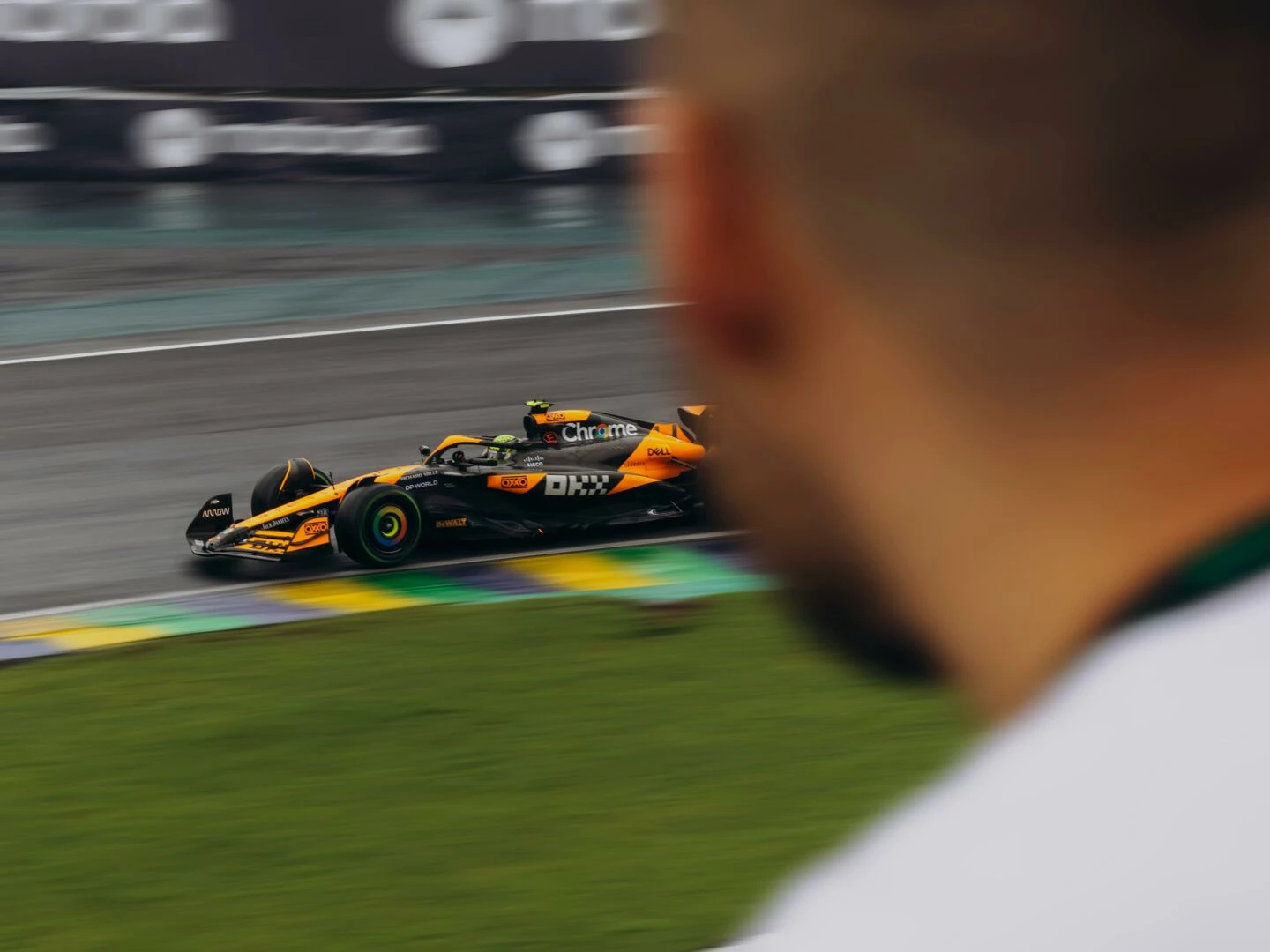 a highspeed formula 1 car races around a track captured in motion