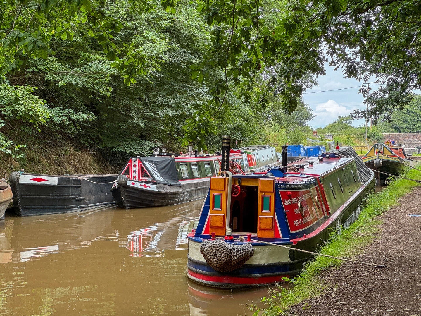 aerial view of a selection of the historic boats on display at audlem wharf 2