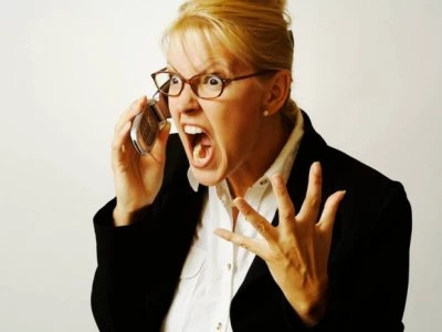 angry businesswoman on phone