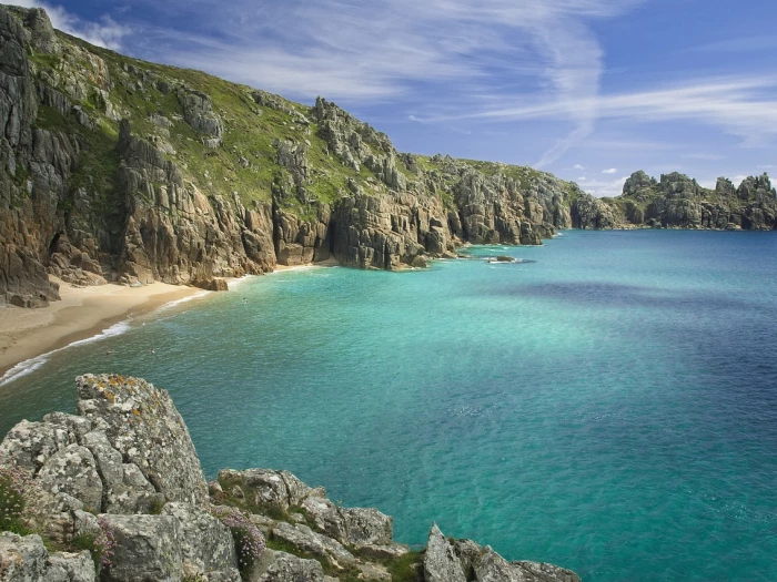 beach cliffs blue sky