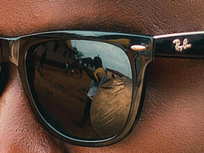Man wearing Ray-ban sunglasses
