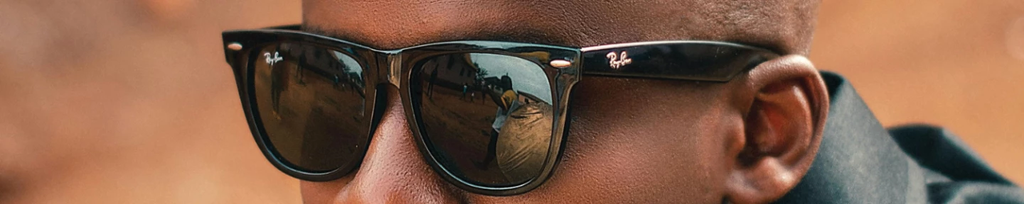 Man wearing Ray-ban sunglasses