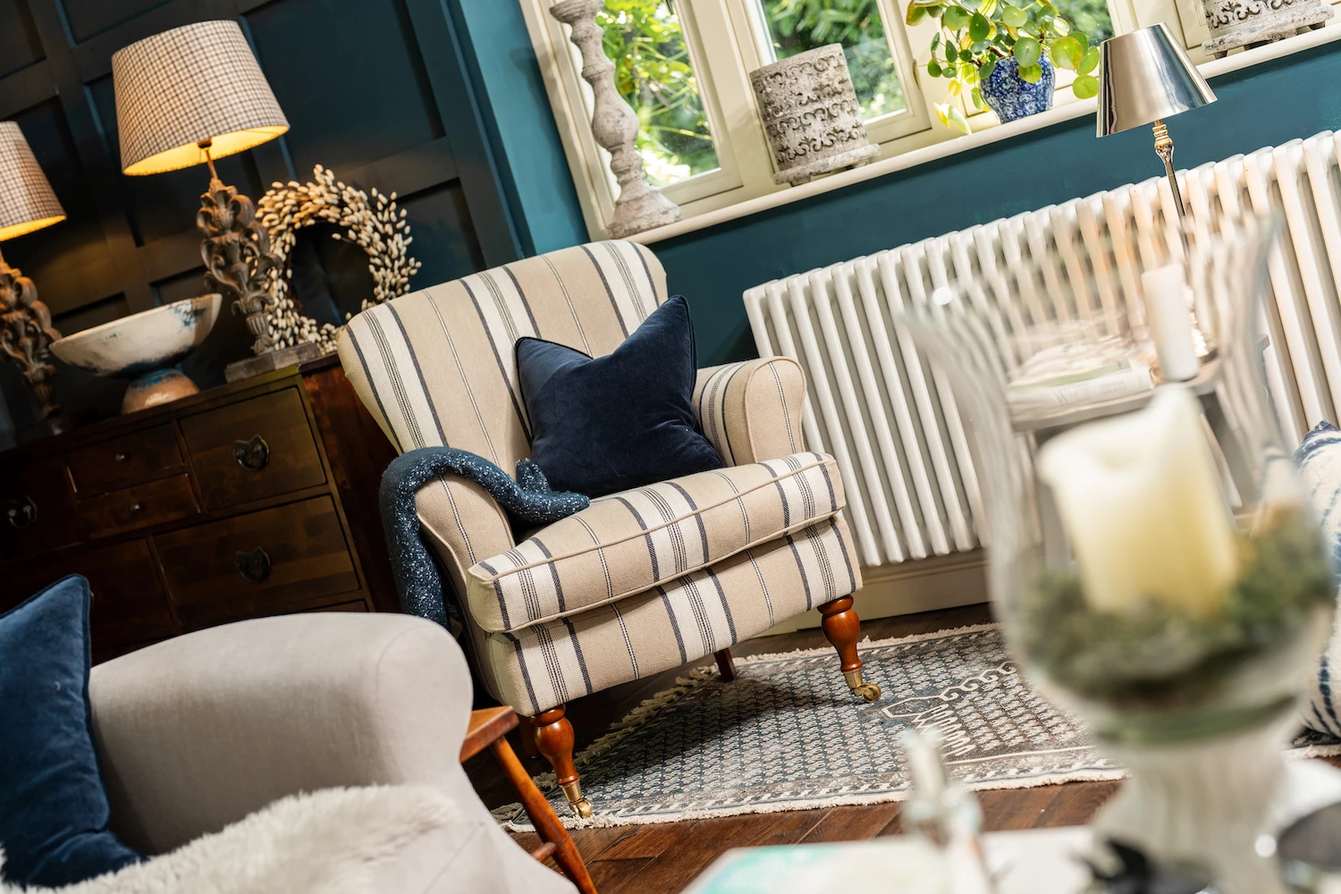 Cream striped chair in blue room