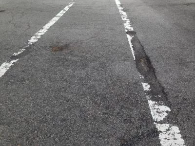 Road_surface_deterioration_by_pavement_markings