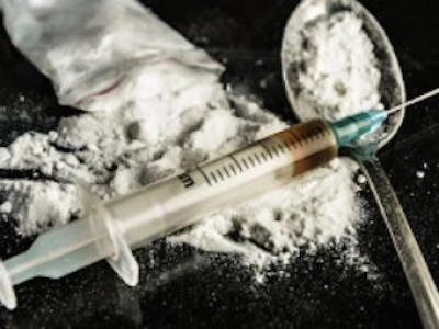 bigstock-Drug-Syringe-And-Cooked-Heroin-76081889-238x179