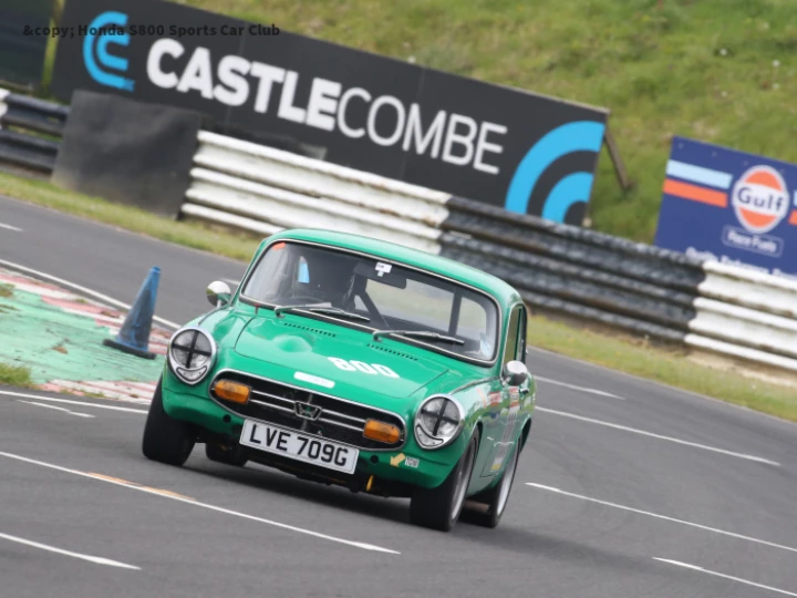 Green race car with Castle Combe logo April 2024
