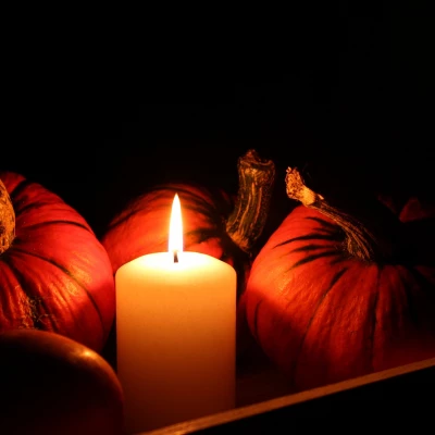 pumpkins and candle
