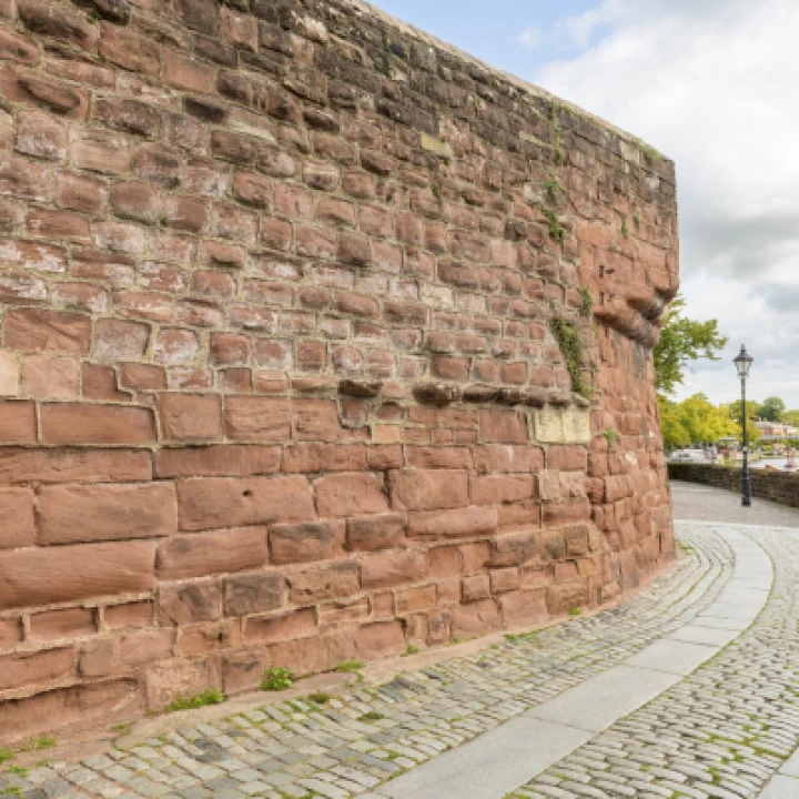 Chester City walls – hard cement mortar standing proud between eroded sandstone