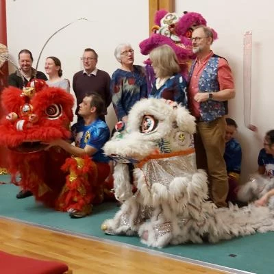 chinese dancers and staff team