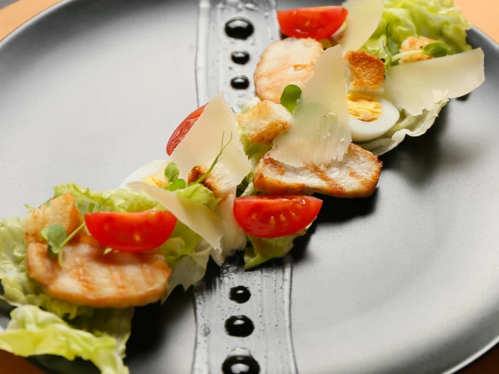 fine dining meal on a grey plate