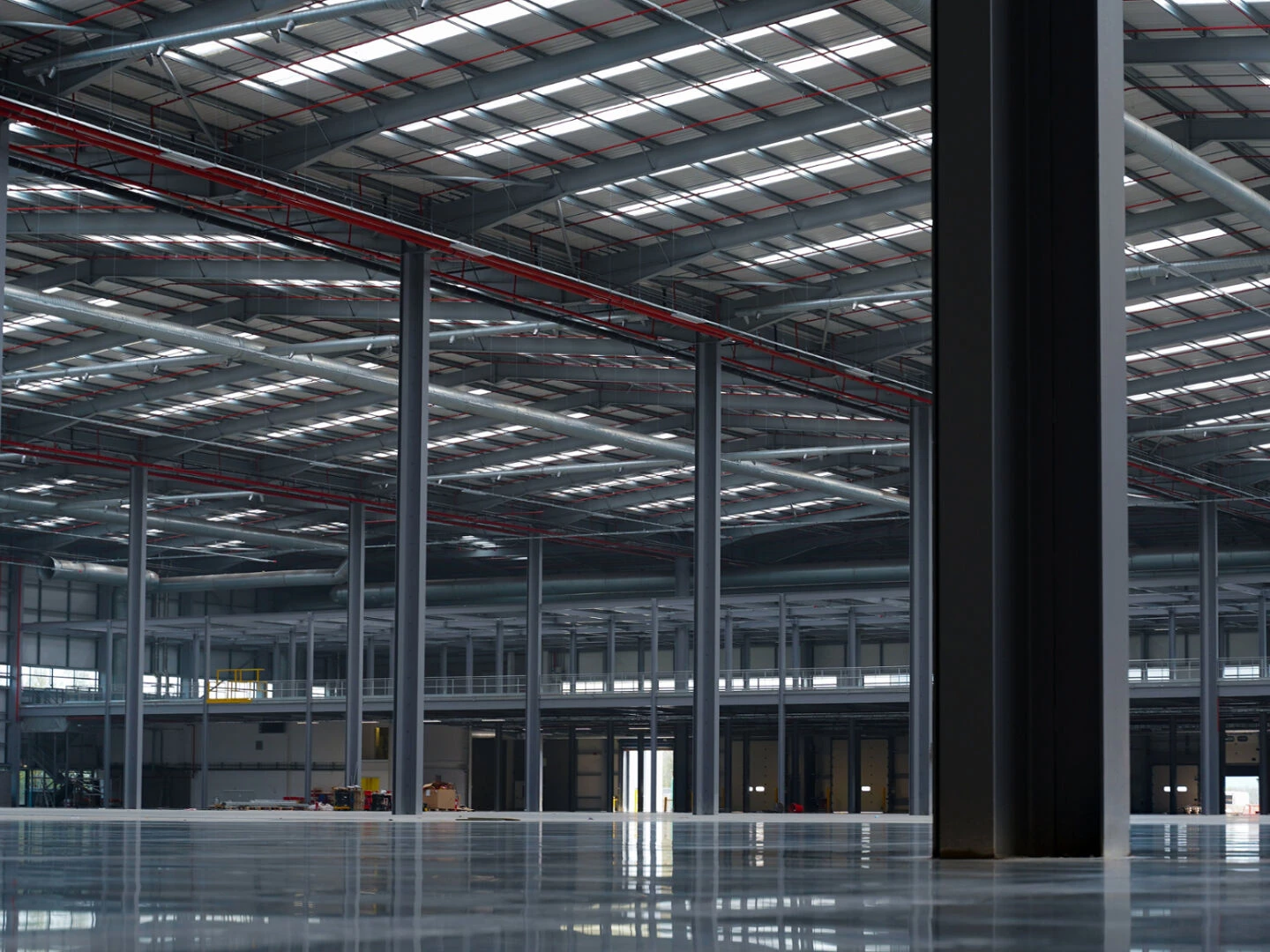 goods stacked in a newly painted warehouse