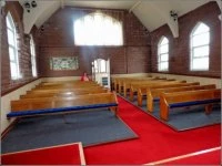 higham the new look  into the church from the front