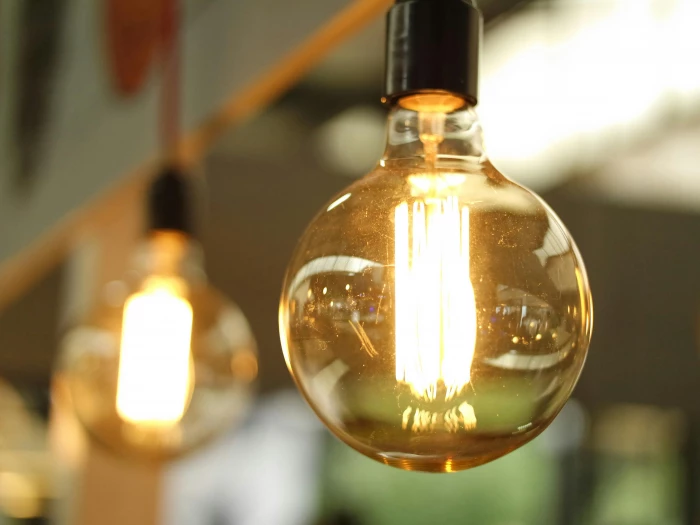 lighted light bulb in selectivefocus photography