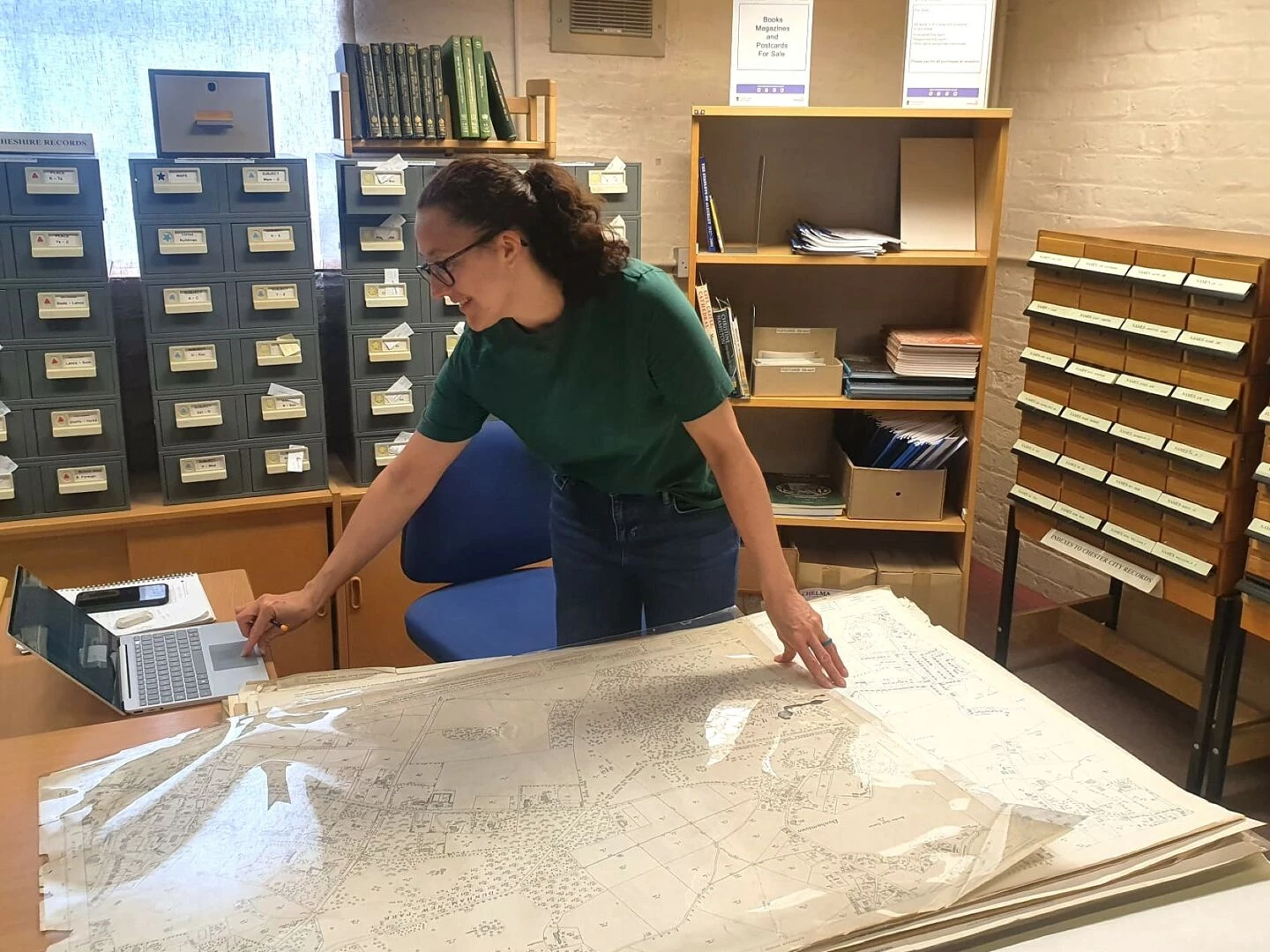 local studies adviser katie owen working with the