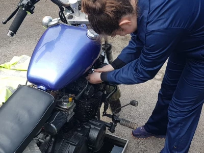 maddie working on mechanics badge