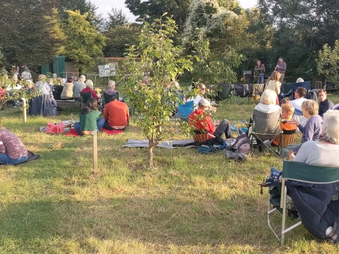 musical picnic in the orchard