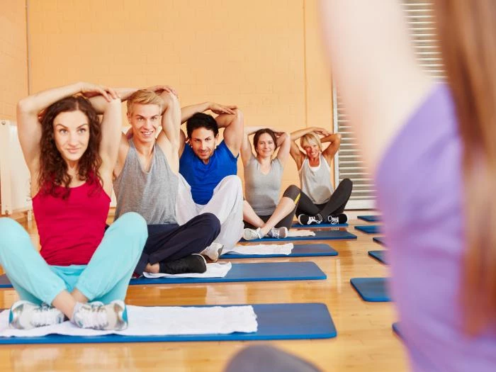 pilates yoga stretch class sitting