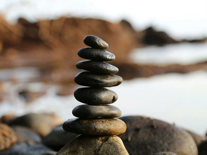 pile of rock near lake