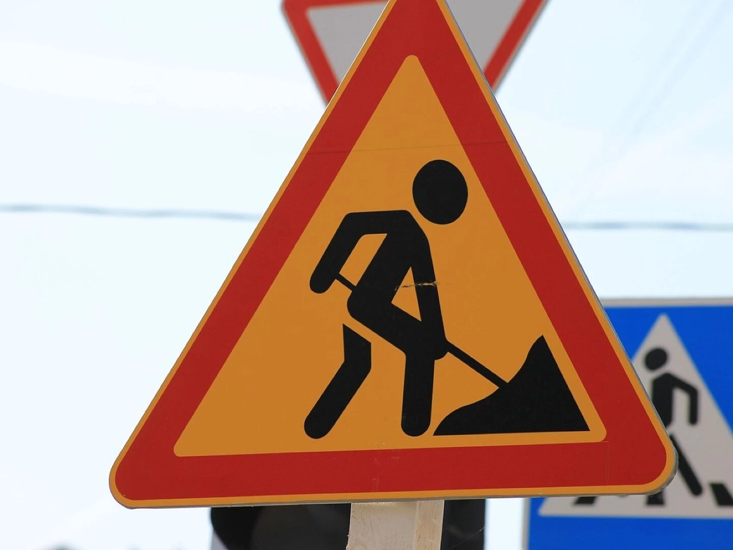 road sign men at work pointer attention a warning building road worker