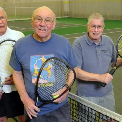 seniors playing tennis